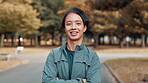 Asian man, face and happy in park for fitness, confidence and ready for exercise in Japan. Japanese person, portrait and outdoor in Tokyo with arms crossed, run break and laugh with positive attitude