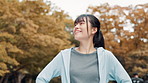 Fitness, inspiration and smile with Japanese woman in nature park for cardio training or workout. Idea, thinking and vision with happy athlete or runner outdoor for exercise, health or wellness