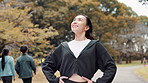 Fitness, smile and vision with Japanese woman in nature park for cardio training or workout. Breathing, idea and thinking with happy athlete or runner outdoor for exercise, health or wellness