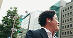 Business man, dance and music in city for commute, positive attitude and energy with earphones. Employee, happy and walking in Japan town for corporate travel, freedom and celebration with streaming