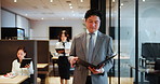 Businessman, Japanese and reading in paperwork for contract, agreement or proposal for planning. Male person, walking and documents as trading portfolio. investment or stock market in office building