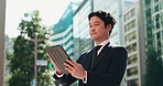 Urban, search and business man with tablet, connectivity and salaryman on morning commute. City, street and Japanese businessman with digital app for communication, networking and online schedule