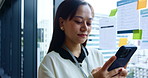 Asian, business woman and typing with phone at office for communication, schedule or project planning. Japanese, female person or employee on mobile smartphone for online chatting or app at workplace
