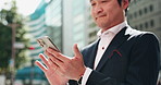 Hands, phone and business man in street, texting and reading for negotiation, deal and chat in city. Person, smartphone and scroll with mobile app, notification or networking on urban road in Japan