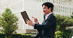 City, video call and business man with tablet, discussion and salaryman on morning commute. Urban, street and Japanese businessman with digital app for communication, networking and online meeting