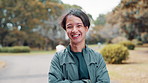 Asian man, face and laugh in park with fitness, confidence and ready for exercise in Japan. Japanese person, portrait and outdoor in Tokyo with arms crossed, run break or happy with positive attitude