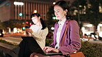 Night, woman and laptop in city for remote work, business deadline and typing in Tokyo. Dark, Japanese workaholic and computer on sidewalk with commitment, research project and networking at bokeh