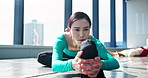 Fitness, girl and dancer stretching legs in studio for health, body wellness or prepare for performance in Japan. Hamstring, flexibility or woman warm up muscle, back exercise or start class on floor