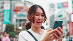 Woman, typing and happy with phone in city for online networking, text message and email response. Japanese person, smartphone and smile with internet search for travel location and urban town map