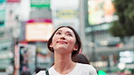 Japanese woman, travel and thinking in city for tourist, sightseeing and exploring for weekend trip. Smile, adventure and happy person commuting with urban town, holiday and destination  for vacation