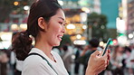 Woman, typing and smile with phone in city for online networking, text message and email response. Japanese person, smartphone and happy with internet search for travel location and urban town map