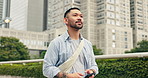 Japanese man, outdoor and mobile phone with thinking, walking and sightseeing in street or city. Male person, technology and confidence on technology for connection, social media app or communication