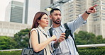 Couple, phone and digital map with directions in city, street and confused for travel and vacation destination. Japanese man, woman and tourism with adventure, support and love on holiday in Tokyo