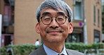 Happy, business and face of mature Asian man in city for company pride, opportunity and confidence. Professional, smile and portrait of Japanese person in town for travel, morning commute and trip