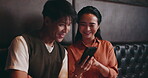 Restaurant, couple and smile with smartphone for Japanese menu, online service or conversation. Relationship, man or woman with mobile application for digital order, scroll options or bonding on date