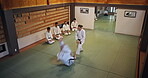 People, students and bow in training for karate, kung fu and practice with fitness, fight and battle. Martial arts, discipline and workout for exercise, class and self defense with combat in Japan