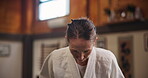 Face, woman or bow in dojo for martial arts practice, discipline and self defense in class. Respect, honor or mature student in Japan for learning combat or training workout for fighting or education