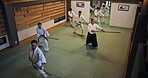 People, students and weapon for martial arts, training and aikido with fitness, kung fu and battle in Japan. Teaching, bokken and sensei for karate, fight and self defense class with exercise in dojo