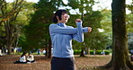 Fitness, stretching and Japanese woman in park for start of cardio exercise, training or workout. Getting ready, sports and warm up with athlete person in forest or nature for health and wellness