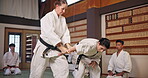 Master, student and fight in Japan for karate, kung fu and practice with fitness, people and battle. Teaching, demonstration and sensei for martial arts, class and self defense with exercise in dojo
