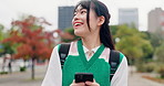 Travel, typing and woman in city with phone, online chat and schedule planning on morning commute. Urban, smile and Japanese university student with smartphone, search or mobile app for communication
