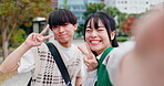 City, couple and face with peace sign for selfie, photography and profile picture for social media. Japanese people, man and woman with emoji reaction for travel holiday, adventure or memory in Tokyo