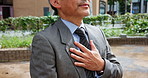 Breathing, business and hand with Japanese man in city for balance, stress relief and peace mindset. Mental health, wellness and corporate with mature person in outdoors for professional and thinking