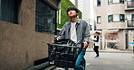 Man, search and bicycle in city for travel, location and building with adventure, commute or trip. Asian person, riding and bike in urban town for eco friendly transport, exercise or morning in Japan