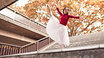 Japanese, woman and ballet dance on subway steps with balance, moving and public performance. Creative, dancer and autumn with Asian culture, tradition and celebration custom on stairs with music