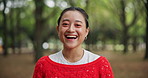 Face, funny and woman in forest, smile and happiness with nature, laughing and Japan. Portrait, Asian person and girl in woods, confidence and travel with environment, cheerful and pride with joy