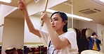 Japanese, woman or teacher with drum or instrument for taiko tradition, culture or music ceremony. Asian, female people or musician with sound, tool or wooden sticks for rhythm or percussion in Japan