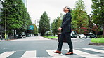 Walking, city and mature man in morning, travel and commuting to work, street and journey for employee. Outdoor, corporate and Japanese person with briefcase on road, professional and lawyer in Japan