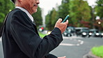 Hands, phone and businessman in street, travel and texting for location, landmark and direction in city. Person, smartphone and outdoor on urban sidewalk with chat, reading and mobile app in Japan