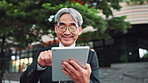 Mature business man, tablet and city with texting, reading and excited for notification on travel to work. Person, touchscreen and happy with app, contact or booking taxi on urban sidewalk in Japan
