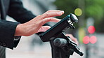 Businessman, hands or phone on electric scooter in city for map app, search location or connectivity in Japan. Closeup, person or tech on eco friendly transport for contact, travel planning or route