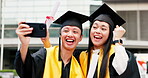 Graduation, students and selfie with celebration on campus for diploma ceremony and education milestone. Japanese people, excited friends and cheering on video call for success and achievement memory