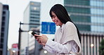 Woman, laughing and phone in town of Japan, funny message and online for social media. Female person, outdoor and communication app on urban adventure, comedy and internet for travel connection