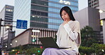 City, laptop and thinking with businesswoman at night for graphic design, research or web development. Computer, idea and planning with Japanese employee outdoor in urban town as professional editor