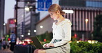City, laptop and planning with businesswoman at night for graphic design, research or web development. Computer, suitcase and travel with Japanese employee in urban town as professional editor