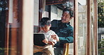 Japanese, learning and father on kids tablet in home with game, family and education app with video. Online, website and development with love, care and support in living room with tech and help