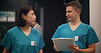 Walking, teamwork and nurses with clipboard for healthcare, checklist and medical information while talking. Hospital, surgeon and intern with document for diagnosis, review or filling forms in Japan