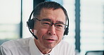 Call center, customer service and man talking on microphone for lead generation and technical support. Help desk, mature japanese consultant and headset for friendly advice, FAQ and CRM telemarketing