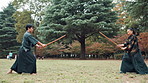 Aikido, fight and sword with Japanese people in forest for start of martial arts exercise or training together. Bokken, bow or respect with man and woman Ninja in nature to practice for competition