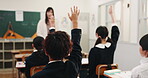 Teacher, students and classroom with question, raised hand and books in education or development. Japanese children, growth and tuition in maths, curriculum and quiz for knowledge, answer or learning