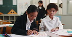 Japanese, kids and students in school, writing and education with help, growth and knowledge. Notebook, Asian children and friends with documents, advice and development with games and studying