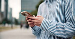 Hands, typing and businessman with phone in city for networking, email and text message in Japan. Mobile, scroll and worker outdoor on internet for chat or property manager check loan application