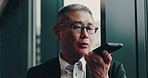 Speaker, voice note and business Asian man in office for communication, recording message and phone call. Corporate, professional and Japanese person on smartphone for contact, reminder and talking