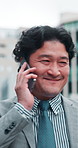 City, businessman and talking with phone call for travel, walking and commute journey with smile. Japanese, male person or lawyer with mobile for networking, conversation or chat with client in Tokyo