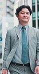 Travel, morning and businessman in city, confident and commuting to work, outdoor and urban street. Walking, professional and Japanese person with ambition, formal and journey for lawyer in Japan