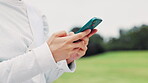 Nature, hands and typing with phone outdoor for web search, mobile chat and text message response. Person, smartphone and online network at park for streaming service, download app or email in Japan
